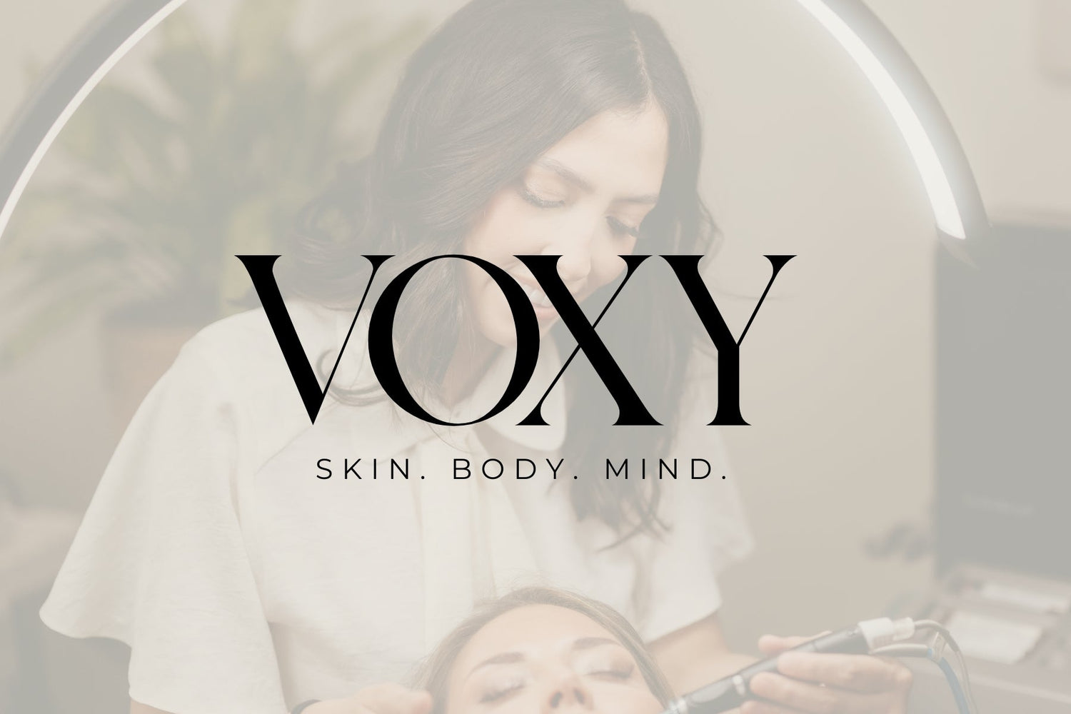 Woman giving hydrafacial at VOXY